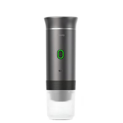 Gray and black electric wine bottle opener with a green light on a white background