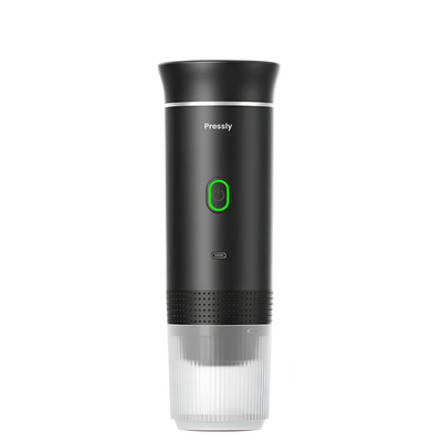 Black and gray device with green light on a white background